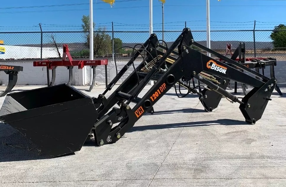 Cargador frontal con autonivelación